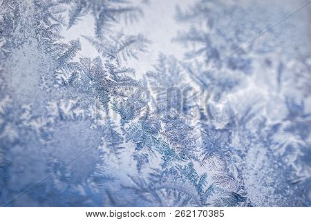 Winter Ice Pattern On The Frozen Window. Texture, Background For Inserting Text. New Year Theme. Win