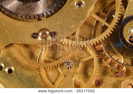 Closeup of the interlocking gears of a pocket watch