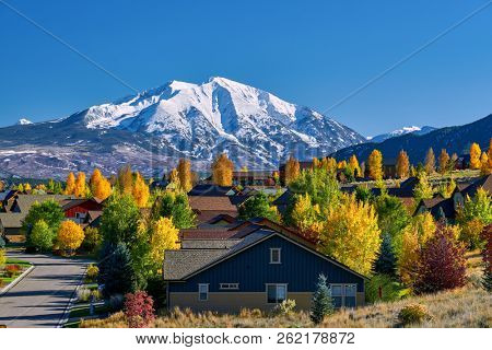 Residential neighborhood in Colorado at autumn, USA. Mount Sopris landscape. 