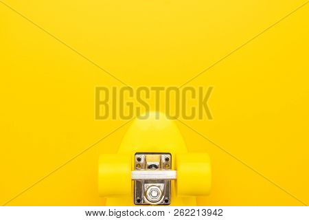 Plastic Mini Cruiser Skateboard On Deep Pink Background. Top View Of Plastic Cruiser Skateboard. Sho