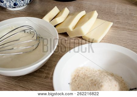 Pieces Of Cheese Eidam And  Bowls  - Preparation For Wrapping And Frying