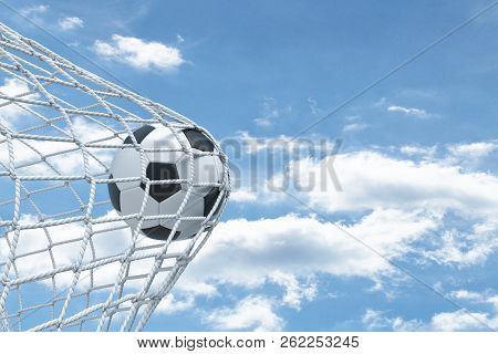 3d Rendering Of A Football Ball Unable To Tear The Net From The Gates With Cloudy Sky In The Backgro
