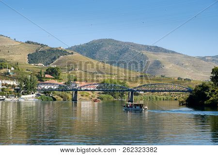Pinhao, Portugal - October 05, 2018 : Boat Carrying Tourists On The Douro River, Vila Real, Portugal