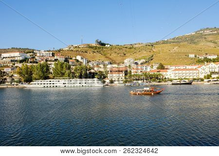 Pinhao, Portugal - October 05, 2018 : Boat Carrying Tourists On The Douro River, Vila Real, Portugal