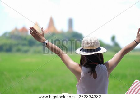 Happy Woman Traveling Backpacker With Hat, Asian Traveler Looking To Tiger Cave Temple ( Wat Tham Su
