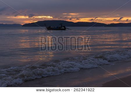 Twilight View Of Waves And Boats