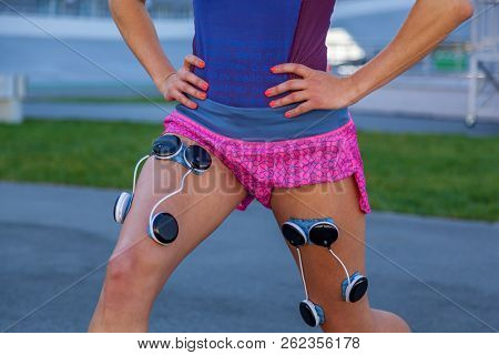 Kiev Ukraine September 21, 2018: Compex Pacemaker For Fitness. Install Electrostimulator On The Musc