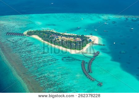 Aerial View On Maldives Island, Ari Atoll. Tropical Islands And Atolls. Summer Holiday Beach Landsca
