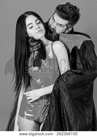 Vampire Bites Female Neck. Couple In Love Play Role Game. Vampires Victim Concept. Man And Woman Dre