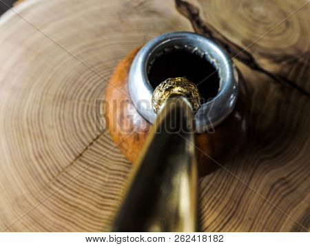 Yerba Mate Drink On Wooden Table. Slice Of Wood