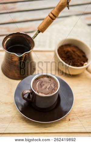 Turkish Coffee With Pot On Wooden Surface