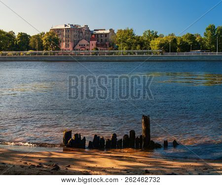 Embankment With Historic Buildings And The Bank Of The Srednyaya Nevka River With The Remains Of An 