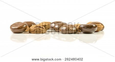 Pepernoten In A Bunch Of Traditional And Chocolate  Treats In A Row On White Background For Annual S