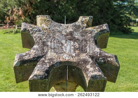 Cumnock, Ayrshire, Scotland, Uk - June 18, 2012: Molded Stone Octogenal Sundial In Garden Of Dumfrie