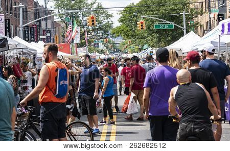 Astoria, New York, Usa - 29 July 2018: A Queens Street Is Full Of People At The Annual Fair By 37th 