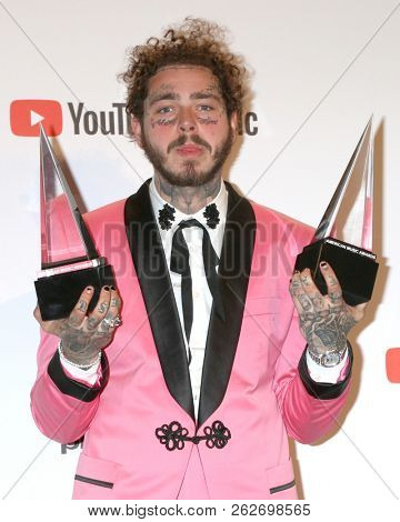 LOS ANGELES - OCT 9:  Post Malone at the 2018 American Music Awards at the Microsoft Theater on October 9, 2018 in Los Angeles, CA