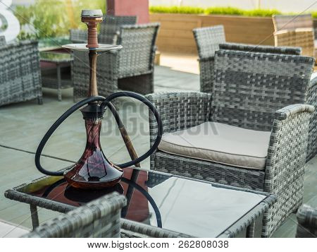 Beautiful New Hookah On The Table On The Summer Terrace. Hookah Russian Production.