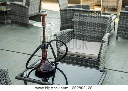 Beautiful New Hookah On The Table On The Summer Terrace. Hookah Russian Production.