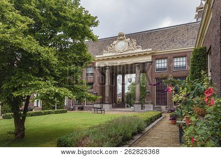 The Entrance Of The Almshouse The Green Garden In The Old Center Of Haarlem In The Netherlands