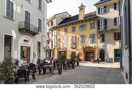Domodossola, Verbania, Italy - November 11, 2016: Pedestrian Street With Typical Outdoor Bars And Sh