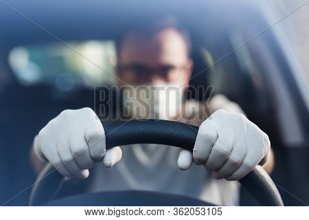 Portrait Of Driver With Face Mask And Medical Gloves, Coronavirus Pandemic Concept.