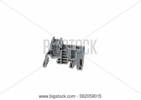 Grey Stopper Block For Electrical Pass Through Terminal For Din Rail, Isolated On White Background