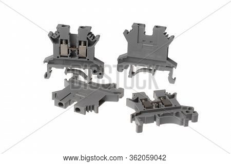 Set Of Grey Electrical Pass Through Terminals For Din Rail, Isolated On White Background