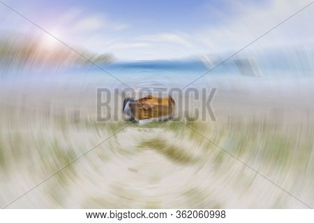 Circular Motion Blur Impressionist Old-fashioned Wooden Clinker Dinghy Pulled On Beach In Vivian Bay
