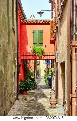 Ancient narrow alley in San Giovanni in Marignano, Italy - Italian cityscape