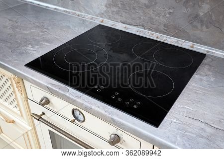 Modern Kitchen Interior With Black Induction Or Electric Hob Stove Cooker With Ceramic Top Surface W