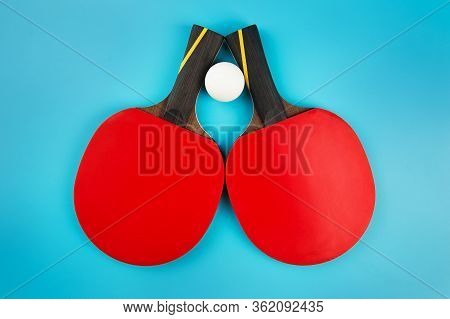 Set To Play Ping-pong On A Blue Background