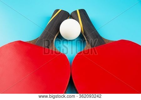 Set To Play Ping-pong On A Blue Background