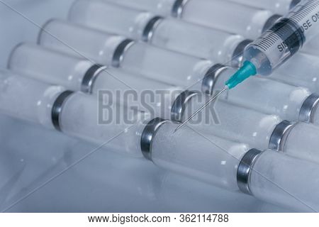 Medicine, Injection, Vaccine And Disposable Syringe, Drug Concept. Sterile Vial Medical Syringe Need