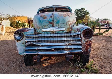 Solitaire, Namibia - Jul 12, 2019: Wrecked Cars Lie Abandoned In The Desert Surrounding Solitaire In