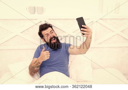 Just Thumb Up. Happy Hipster Give Thumb Up To Phone Camera. Bearded Man Smile With Thumb Up And Smar