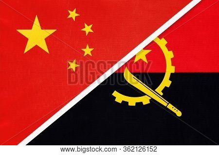 China Or Prc Vs Angola National Flag From Textile. Relationship Between Asian And African Countries.