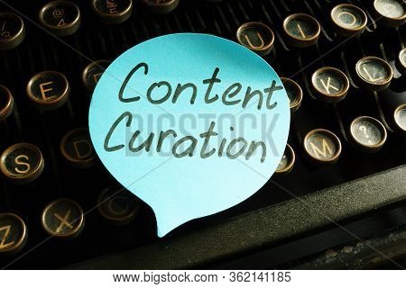 Content Curation Strategy Handwritten Inscription On The Typewriter.