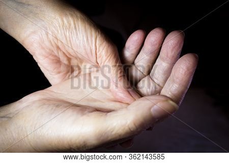 Hands Of Elderly Woman Doing A Selfmassage. Manual Physiotherapy