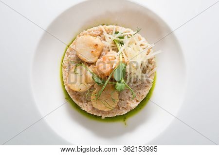 Scallops And Shrimps Served With Brown Rice