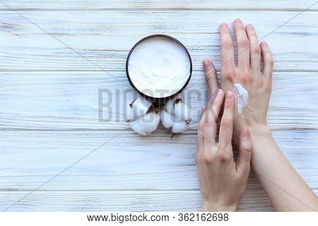 Woman Puts On Hands Cream, Hand Care, Top View