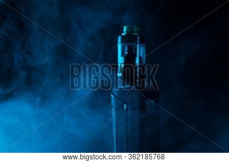 Vape Close-up In A Smoke On A Black Background