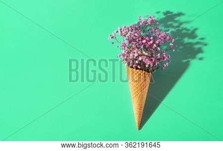 Small Bouquet On A Minty Background. Pink Flowers. Waffle