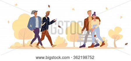 Young Multiethnic People In Fall Park. Boyfriend Hugging Girlfriend Going Together. Romantic Dating.