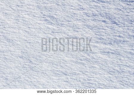Abstract Clear White Snow In Sunny Day As A Background.