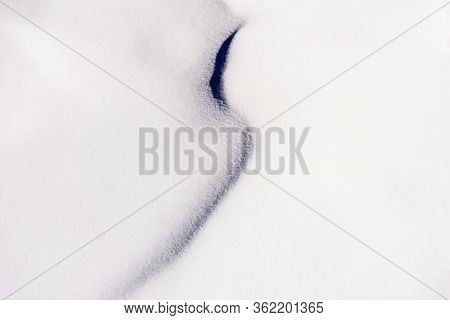 Abstract Clear White Snow In Sunny Day As A Background.