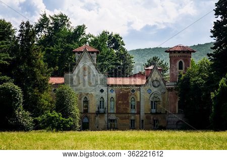 Pinerolo, Italy - June 25, 2017: The Castle Of Miradolo, Ancient Neo-gothic Palace In San Secondo Of