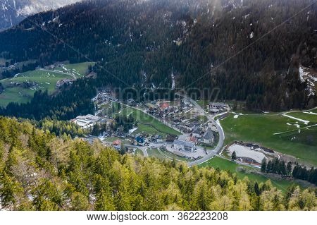 Aerial View Of Huge Valley Of The Mountains Of Italy, Trentino, Green Meadows, Slopes With Green Spr