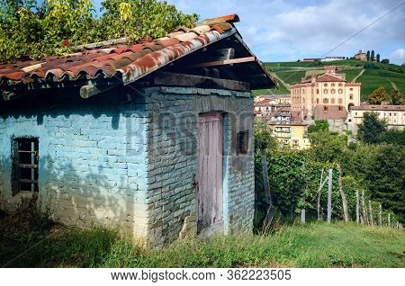 Panorama Of Barolo (piedmont, Italy) With The Town, The Medieval Castle And The Vineyards. Barolo Is