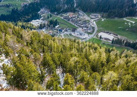 Aerial View Of Huge Valley Of The Mountains Of Italy, Trentino, Green Meadows, Slopes With Green Spr