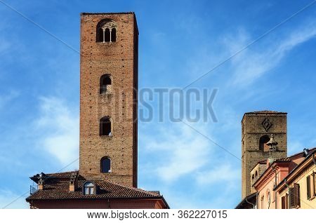 Detail Of Piazza Risorgimento, Main Square Of Alba (piedmont, Italy) With The Medieval Towers